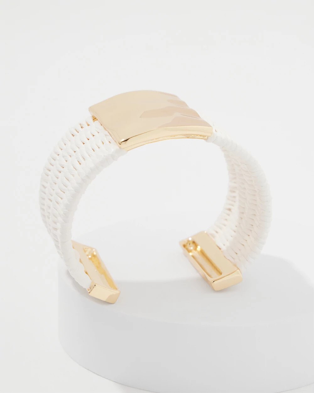 WHBM_BR20Gld20Ecru20Raffia20Cuff_570393572_IVO000190_TT_ALT201.jpeg