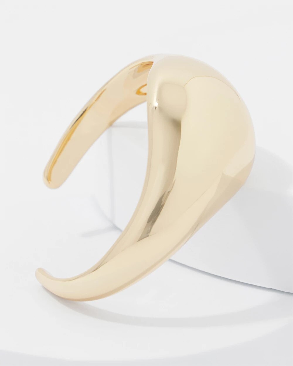 WHBM_BR20Gld20Sculptural20Cuff_570393081_TAN000932_TT_ALT201.jpeg