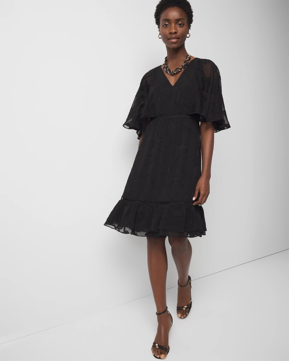 WHBM_Flounce20Sleeve20BO20Mini_570391871_BLK000001_OF_MAIN-1.jpeg