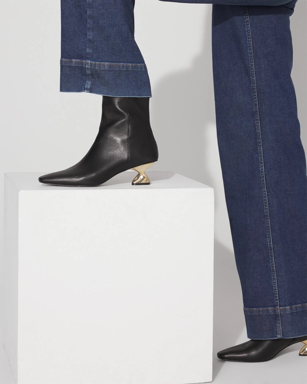 WHBM_Gold20Twist20Heeled20Boot_570393516_BLK000001_OF_MAIN-1.jpeg