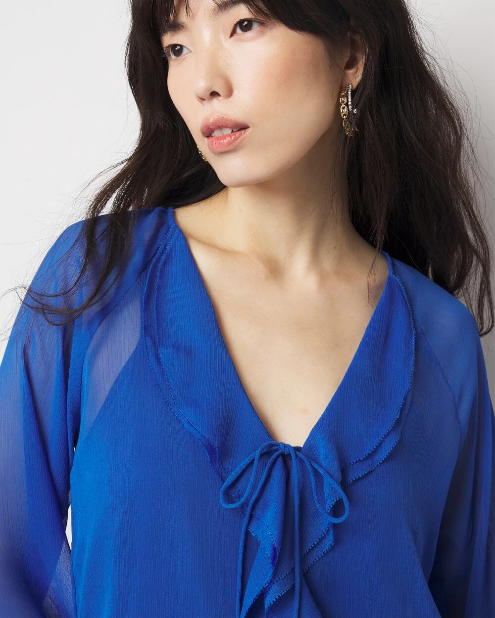WHBM_LS20Ruffle20Front20Blouse_570392545_BLU001827_OF_ALT202.jpeg