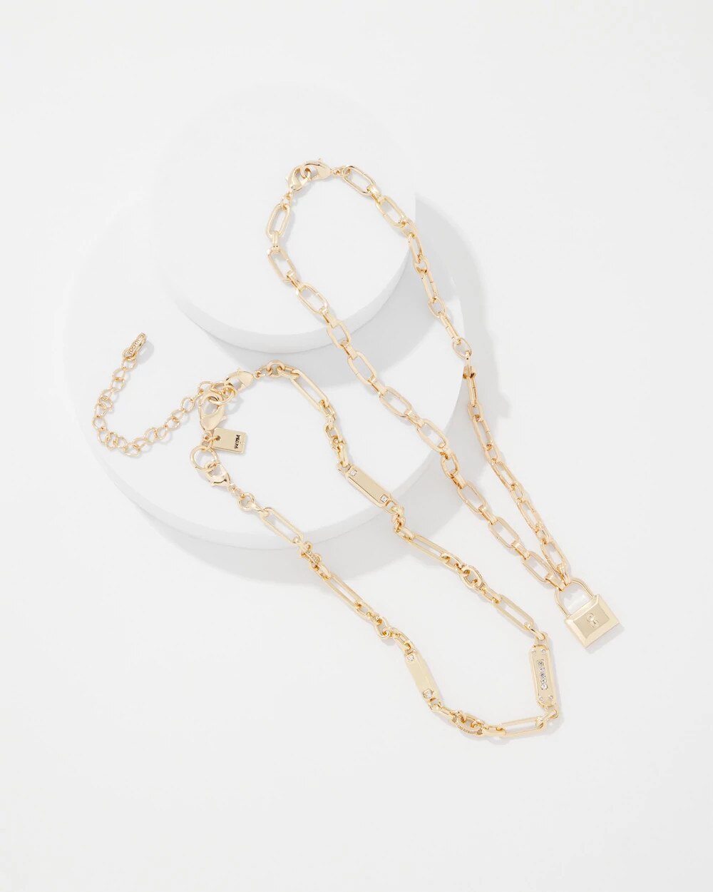 WHBM_NK20Gld20Cnvt20Padlock20Charm_570405667_TAN000932_TT_ALT201.jpeg