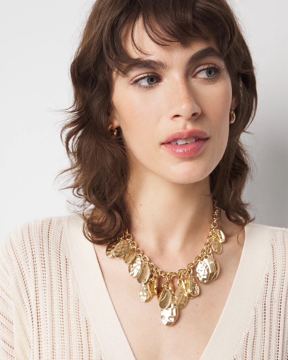 WHBM_NK20Gld20Hammered20Disc_570394261_TAN000932_OF_MAIN.jpeg