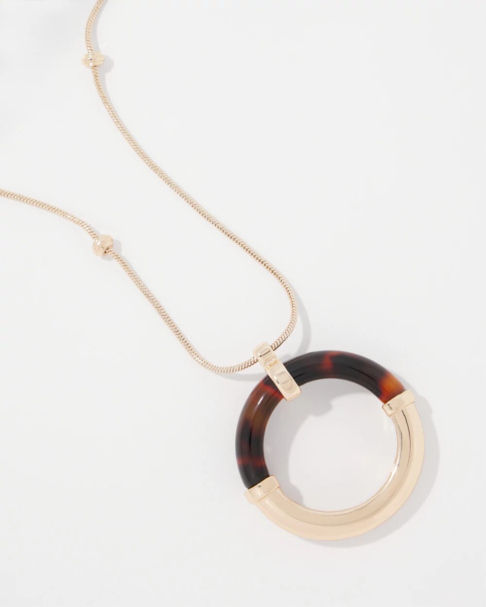 WHBM_NK20Gld20Tort20Ring20Pendant_570398993_BLK000923_TT_ALT202.jpeg