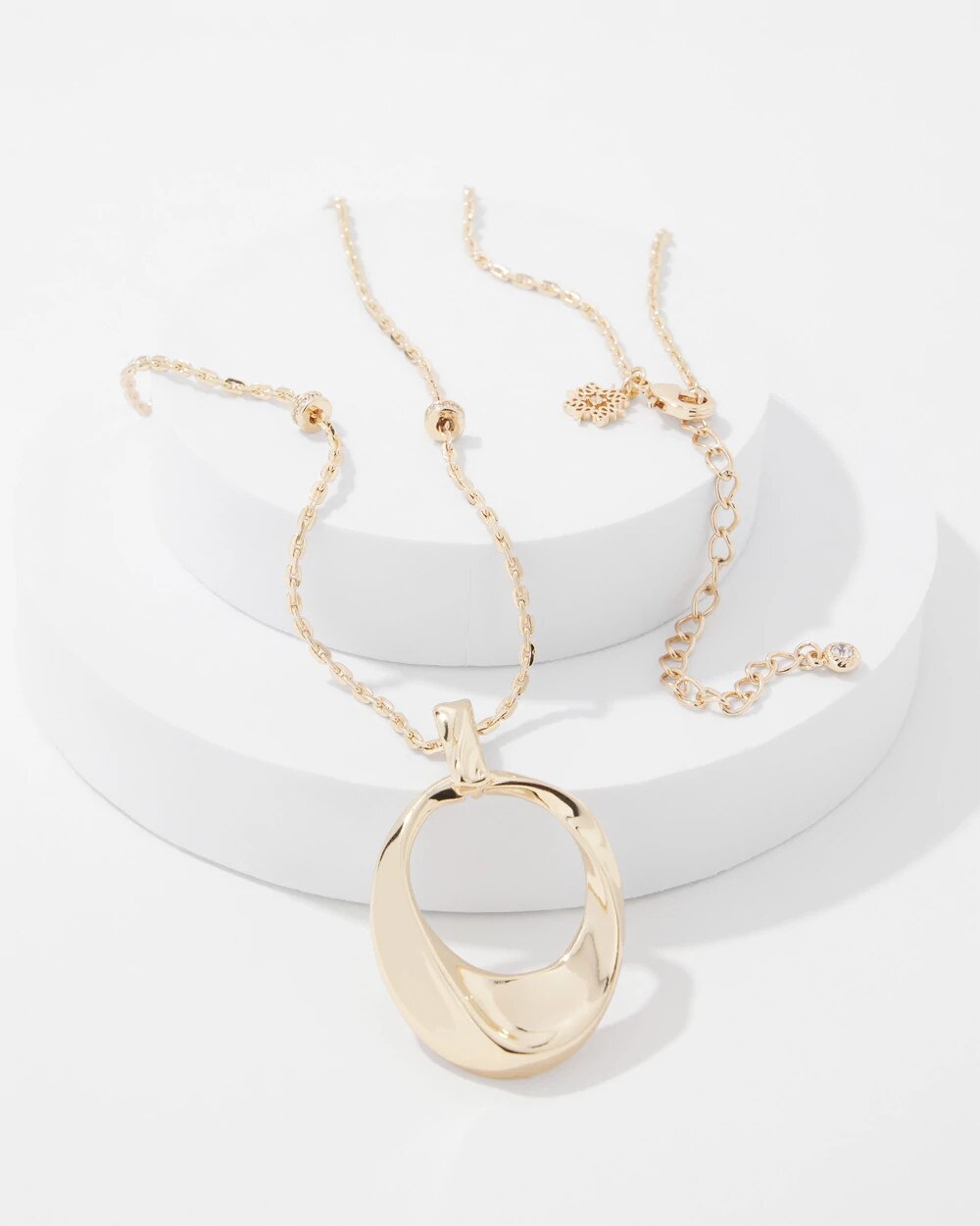 WHBM_NK20Gld20Twisted20Pendant_570398432_TAN000932_TT_ALT201.jpeg