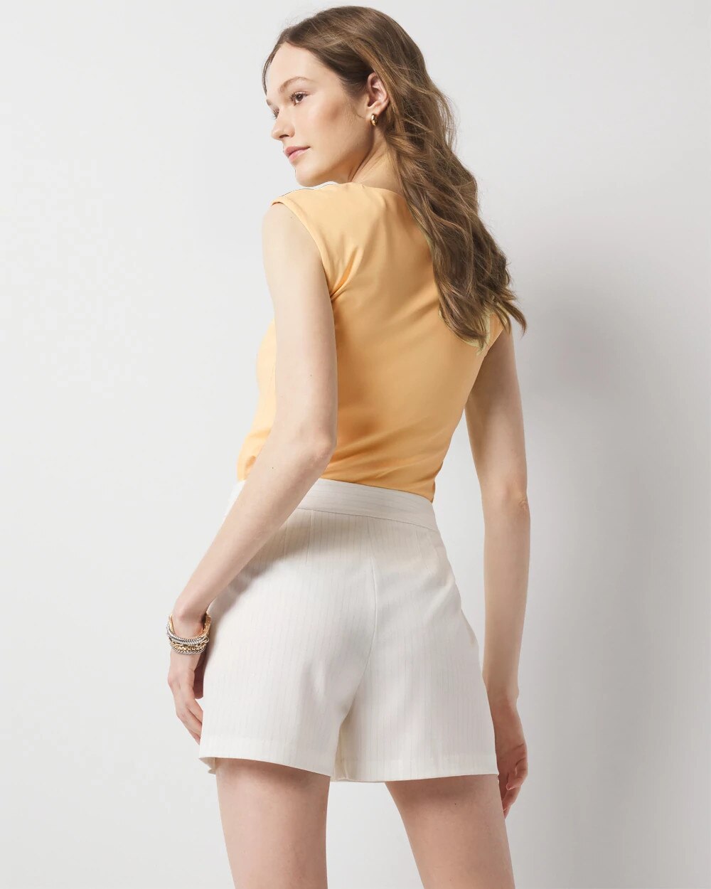 WHBM_Pinstripe20Tailored20Skort_570387811_IVO001047_OF_ALT201.jpeg