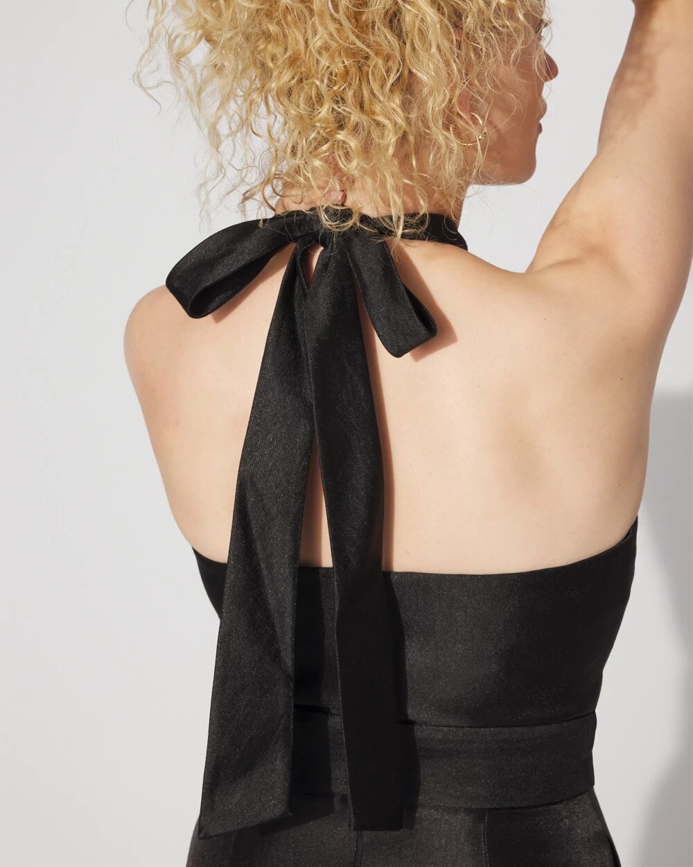 WHBM_SL20Halter20Jumpsuit_570391876_BLK000001_OF_ALT202.jpeg