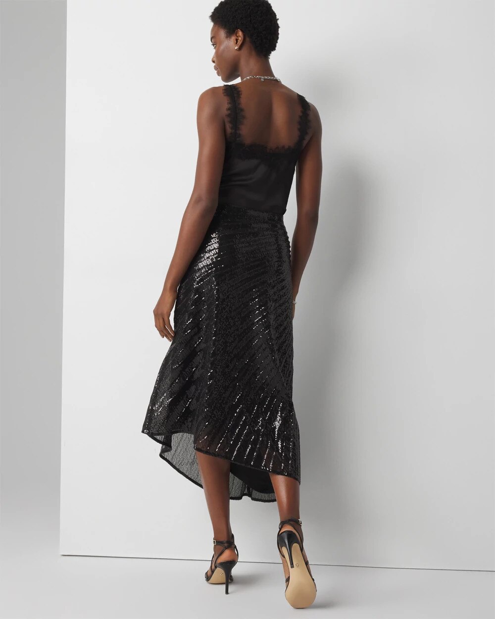WHBM_Sequin20Asymm20Skirt_570378577_BLK005533_OF_ALT203.jpeg