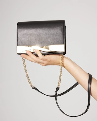 WHBM_Twisted20Hardware20Clutch_570393610_BLK000001_OF_MAIN-2.jpeg